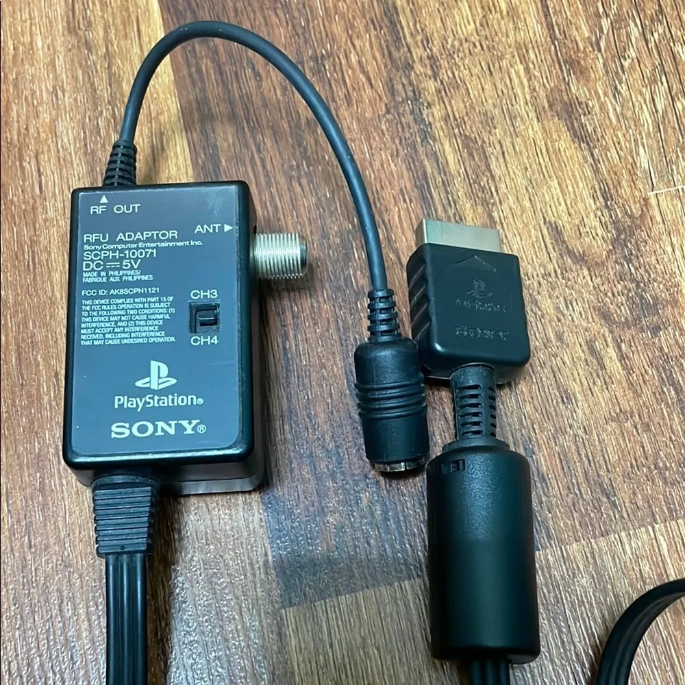 Sony Black PlayStation RFU adaptor